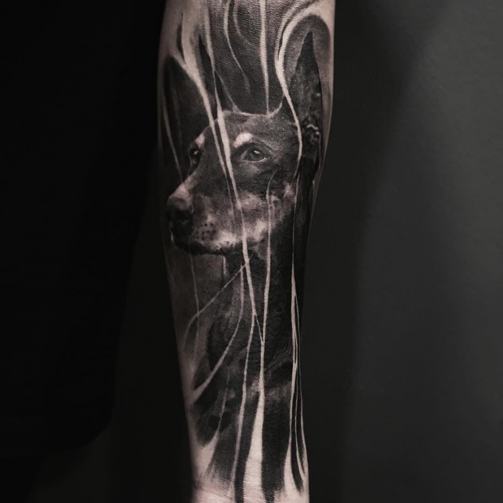 点击大图看下一张：手臂纹身图片创意纹身图案