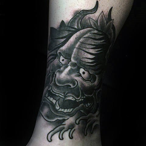 点击大图看下一张：日本鬼面具纹身  凶神恶煞的日本鬼面具纹身图案