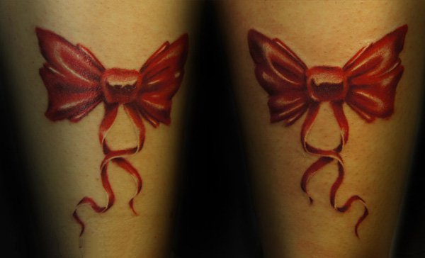 点击大图看下一张：蕾丝蝴蝶结纹身   少女心满满的蕾丝蝴蝶结纹身图案