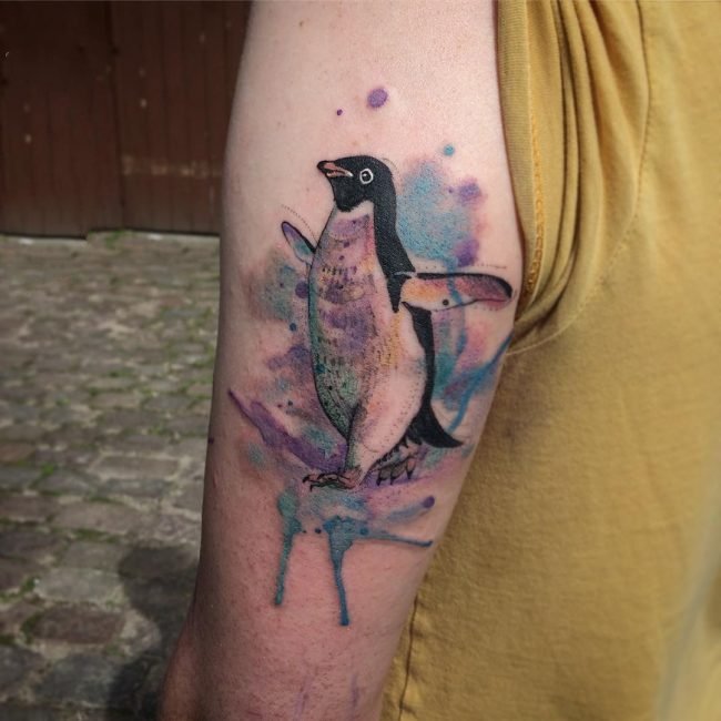 点击大图看下一张：企鹅纹身图   形象呆萌的企鹅纹身图案