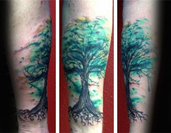 点击大图看下一张：纹身树木的图像    生意盎然的树木纹身图案