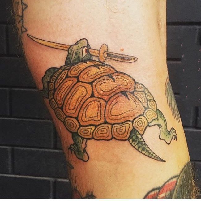 点击大图看下一张：乌龟纹身图案   行动缓慢的乌龟纹身图案