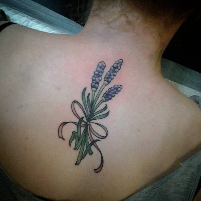 点击大图看下一张：纹身图案花朵   令人心动的花朵纹身图案