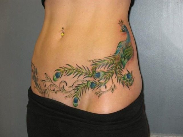 点击大图看下一张：小动物纹身 彩色的女性腹部精致的小动物纹身图案