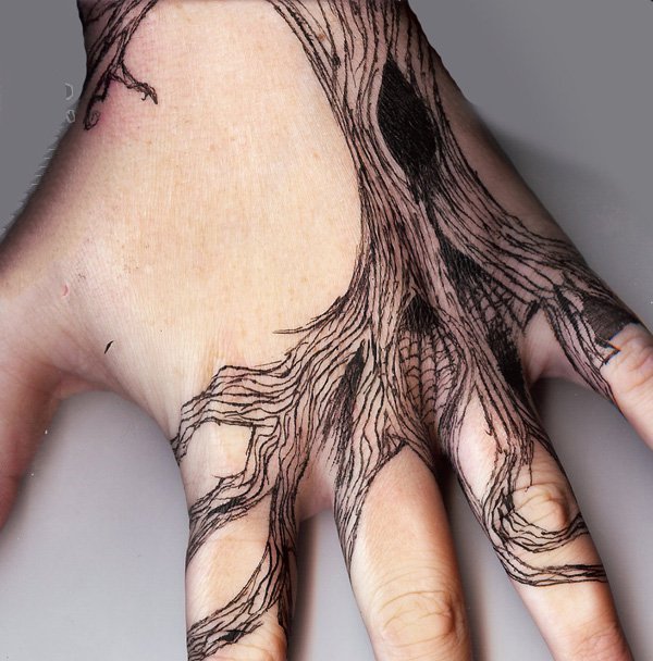 点击大图看下一张：手部纹身图   创意百变的手背纹身图案
