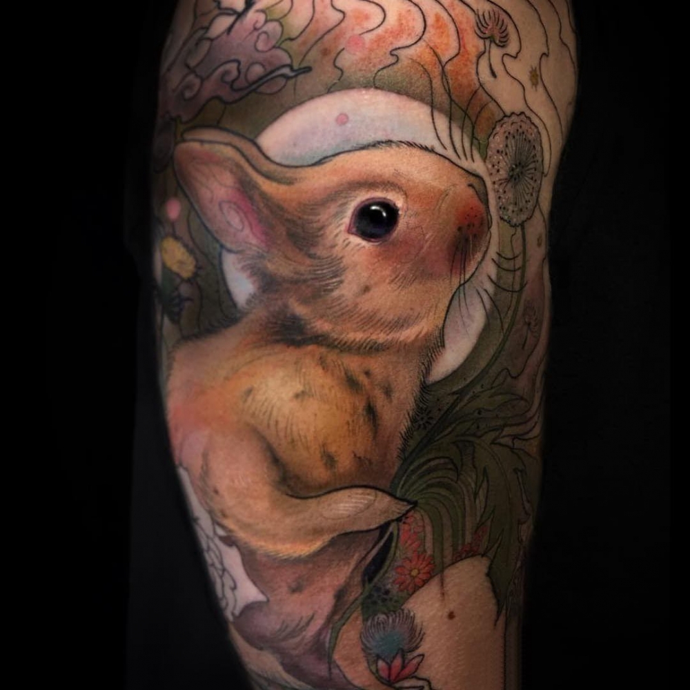 点击大图看下一张：兔子纹身图案  呆萌可爱的兔子纹身图案
