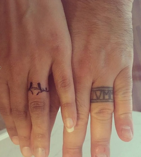 点击大图看下一张：情侣纹身戒指   爱意浓浓的情侣戒指纹身图案
