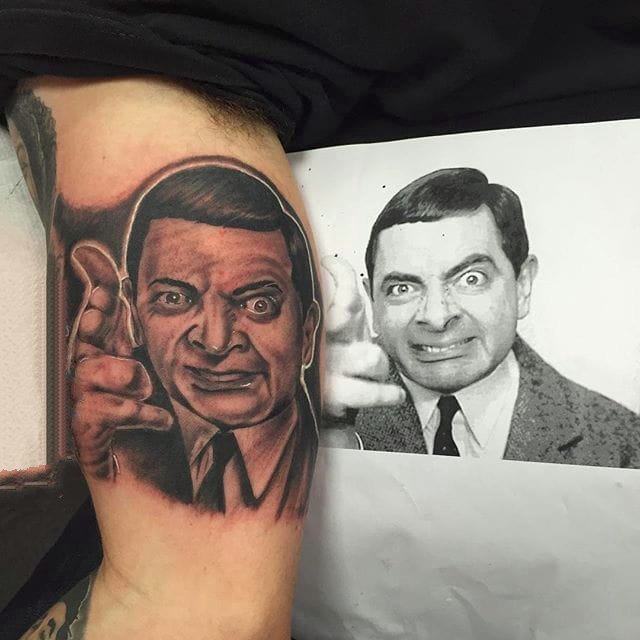 点击大图看下一张：人物肖像纹身 有趣的喜剧艺人憨豆先生纹身图案