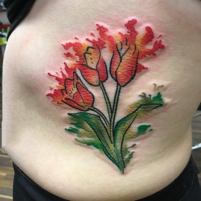 点击大图看下一张：纹身图案花朵  娇艳欲滴的花朵纹身图案