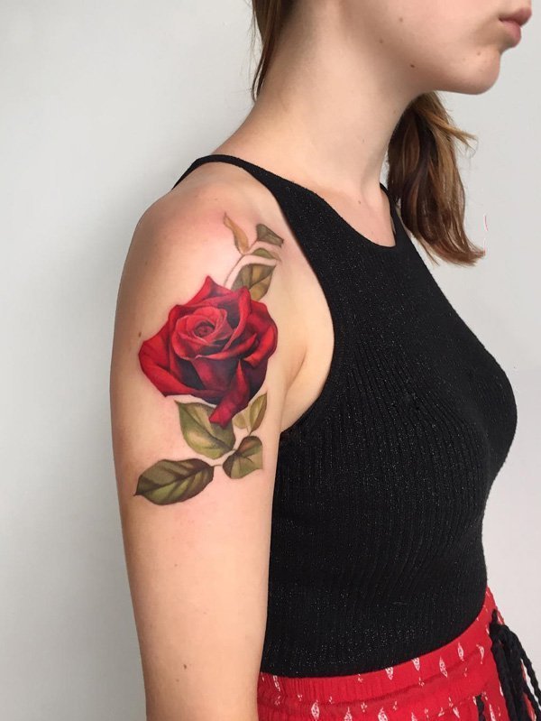 点击大图看下一张：玫瑰纹身图    蓓蕾初开的玫瑰纹身图案