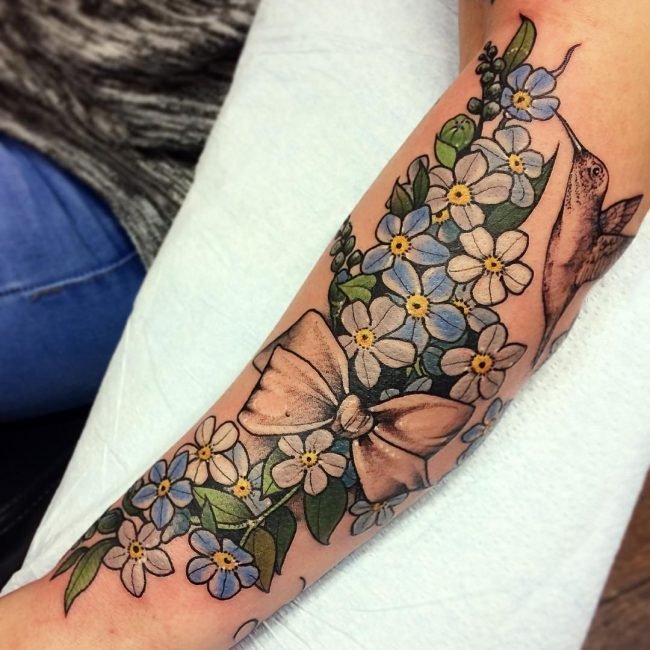 点击大图看下一张：纹身图案花朵  美艳而又清新靓丽的花朵纹身图案