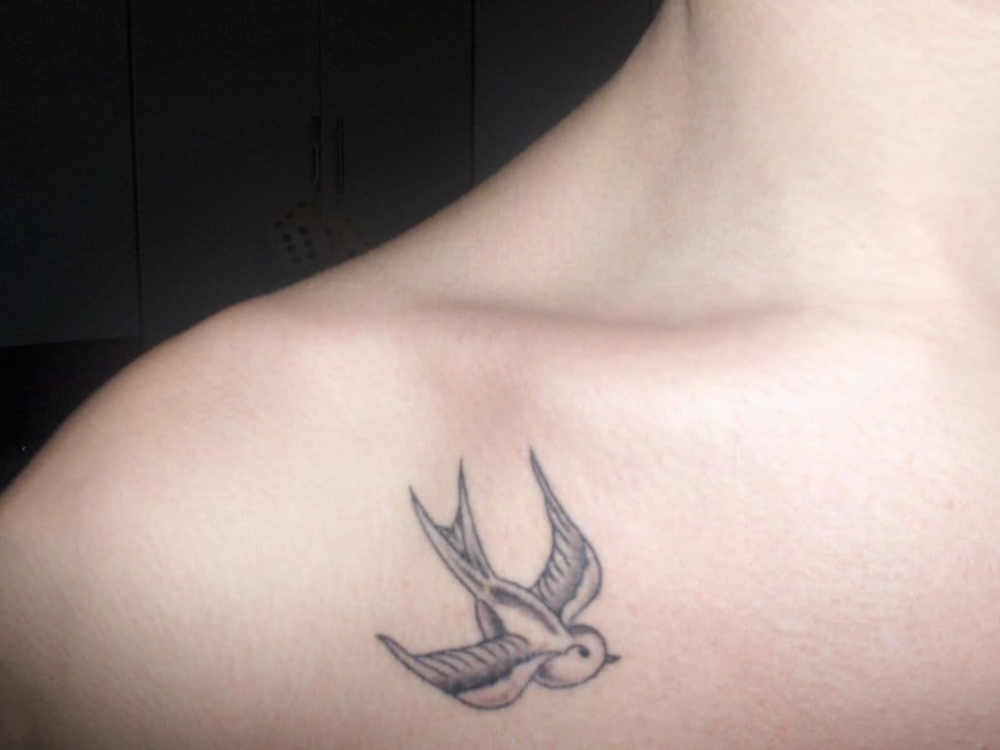 点击大图看下一张：纹身燕子 创意纹身小燕子飞鸟纹身图案