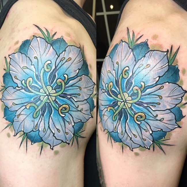 点击大图看下一张：唯美纹身小图案   清新秀雅的花朵纹身图案
