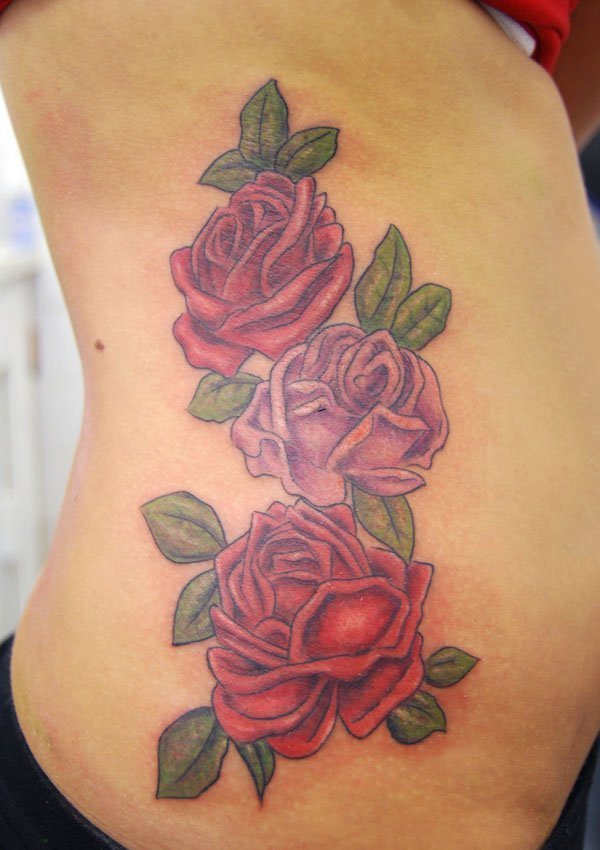 点击大图看下一张：玫瑰纹身图  艳丽动人的玫瑰花纹身图案