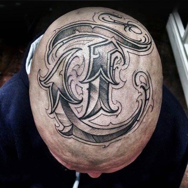 点击大图看下一张：头部纹身图案   个性十足的男生头部纹身图案