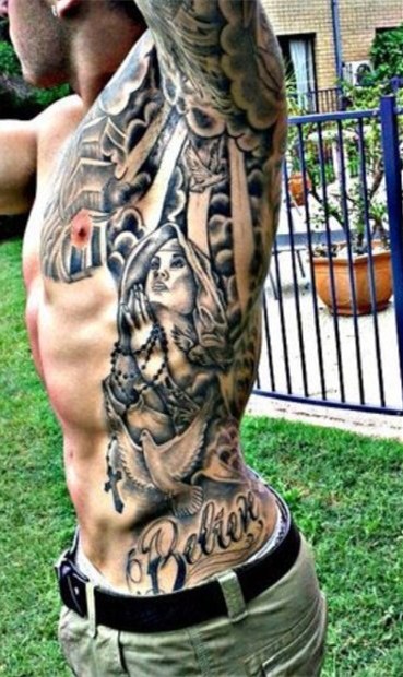 点击大图看下一张：腰部纹身   多款男生霸气的腰部纹身图案