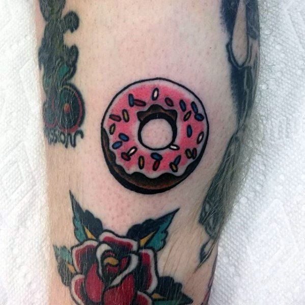 点击大图看下一张：食物纹身   美味诱人的甜甜圈纹身图案