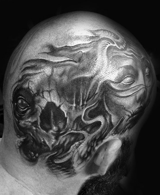 点击大图看下一张：男性头部纹身_11张酷酷的黑灰男性头部纹身图案作品欣赏