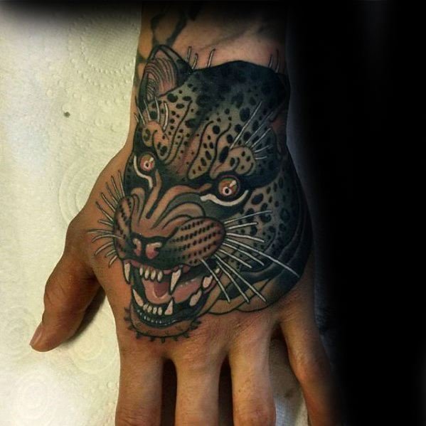 点击大图看下一张：雪豹纹身_9张动物雪豹纹身图案图片