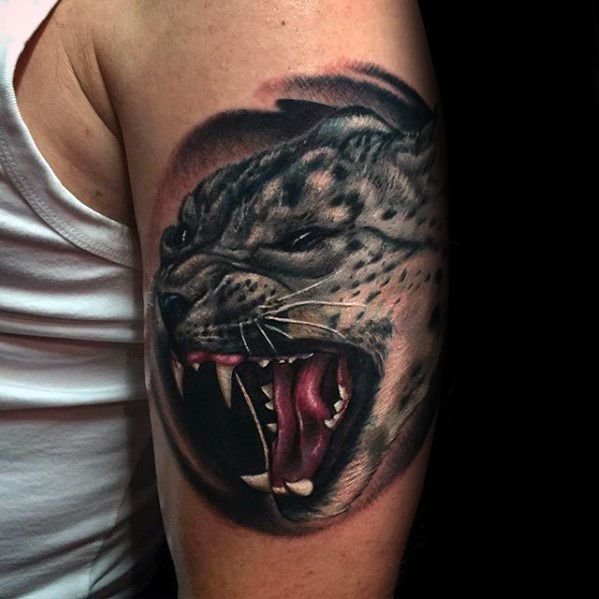 点击大图看下一张：雪豹纹身_9张动物雪豹纹身图案图片