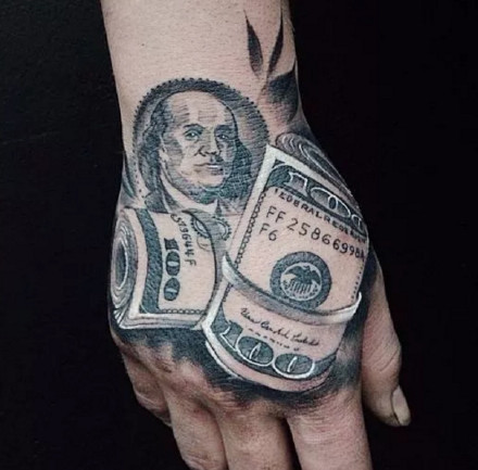 点击大图看下一张：钞票纹身图案-随身带着钱的钞票创意纹身图片