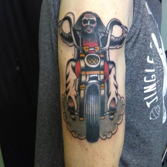 点击大图看下一张：摩托车纹身图案-创意的霸气精致的摩托车骑手纹身图案