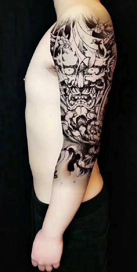 点击大图看下一张：大黑花臂纹身--一组7张精品大黑花手臂纹身图案