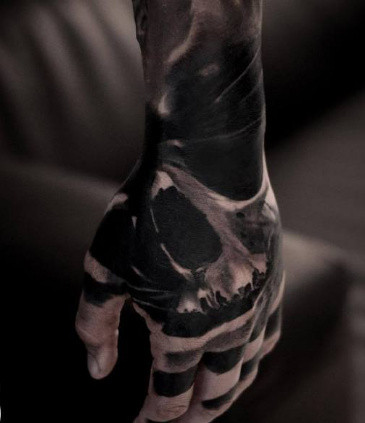 点击大图看下一张：几张写实大黑手背纹身作品图