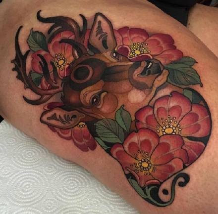 点击大图看下一张：动物+花朵的一组纹身图案作品欣赏