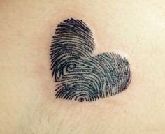 点击大图看下一张：指纹纹身--一组创意指纹爱心纹身图案欣赏