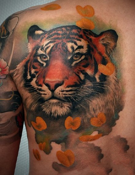 点击大图看下一张：老虎纹身图--9张个性的百兽之王老虎纹身图案作品
