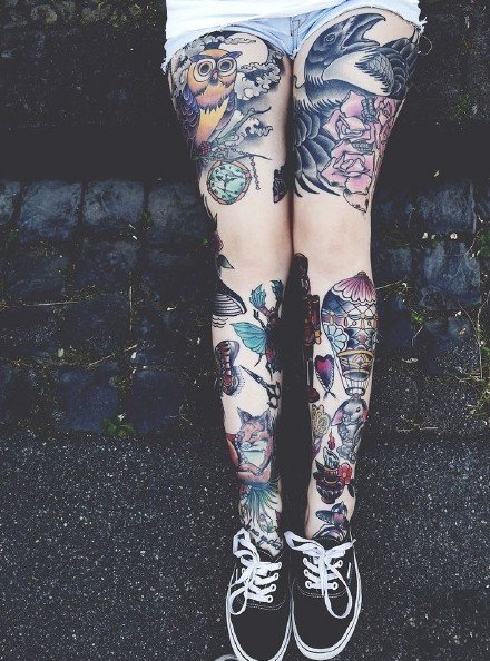 点击大图看下一张：9张女生漂亮的花腿纹身图案作品欣赏