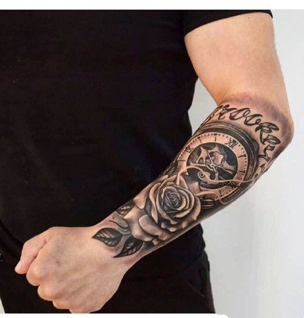 点击大图看下一张：黑臂时钟纹身--一组男士小手臂上的黑臂时钟指南针纹身图案
