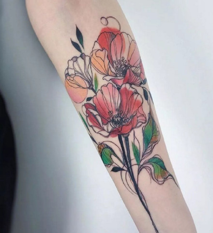 点击大图看下一张：线条感不错的手臂腿部的花朵纹身图案