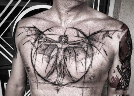 点击大图看下一张：胸部线条纹身--线条感极强的男性花胸个性纹身图案