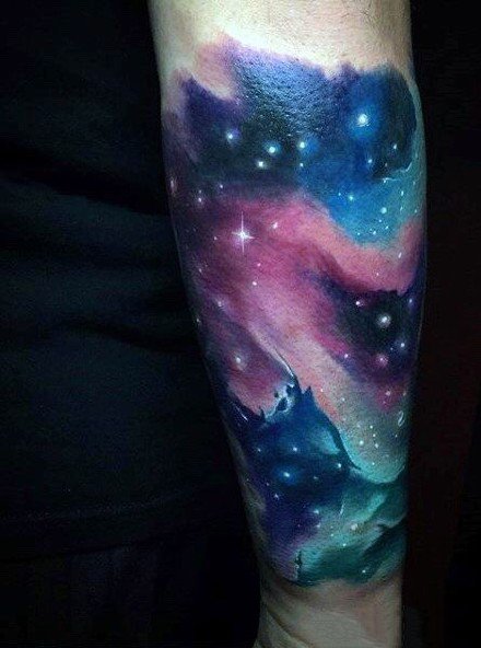 点击大图看下一张：一组炫彩色星空星球宇宙相关的纹身图案作品