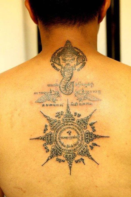 点击大图看下一张：5张宗教相关的刺符经文的纹身作品图案
