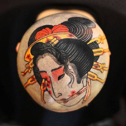 点击大图看下一张：来自日本的艺伎生首纹身图案作品9张