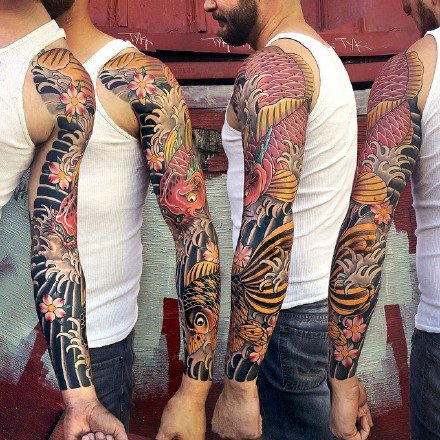 点击大图看下一张：漂亮传统风格的一组花臂纹身图案作品
