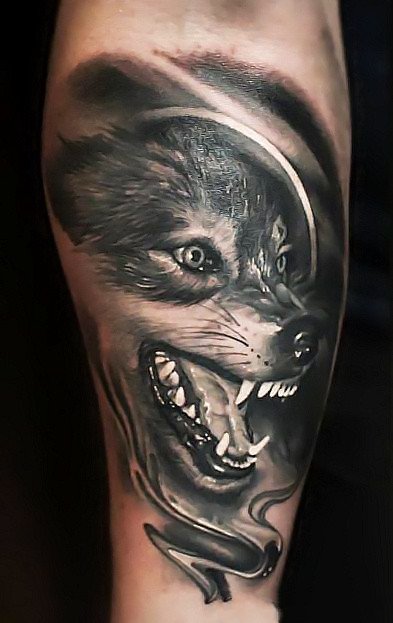 点击大图看下一张：霸气的一组眼光犀利的狼图案纹身作品