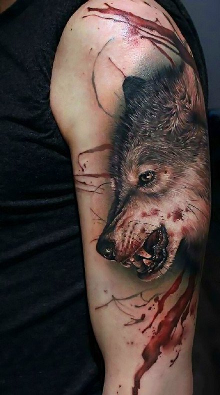 点击大图看下一张：霸气的一组眼光犀利的狼图案纹身作品