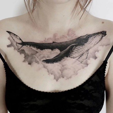点击大图看下一张：象征自由的一组鲸鱼相关的纹身图案作品