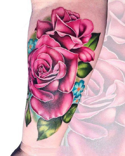 点击大图看下一张：小手臂上的一组粉红色花朵纹身作品图片