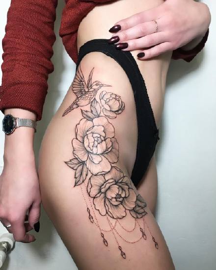 点击大图看下一张：很性感的一组女士大腿侧部的纹身图案欣赏