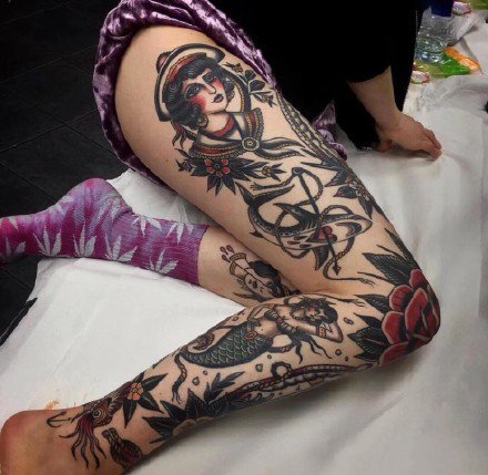 点击大图看下一张：欧美shool风格的花臂和花腿纹身图案赏析