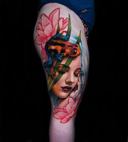 点击大图看下一张：9张漂亮大腿上的彩色写实纹身图案作品