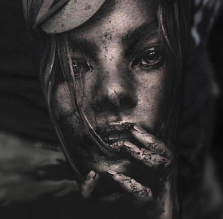 点击大图看下一张：欧美黑灰写实纹身：大臂和大腿上逼真的欧美3d写实纹身图案