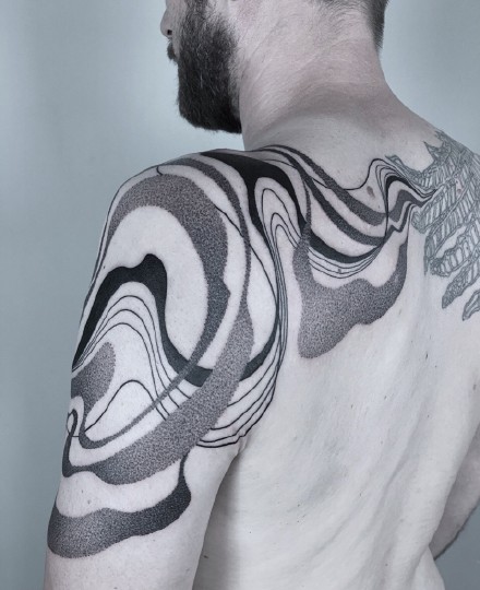 点击大图看下一张：波浪线条组成的创意抽象纹身作品