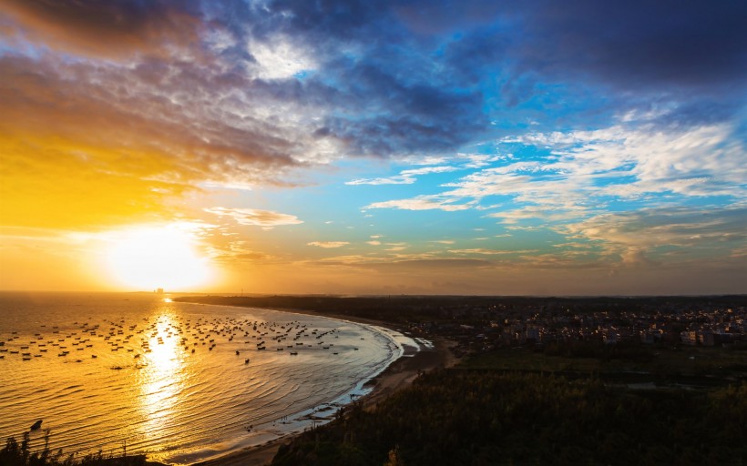 点击大图看下一张：电白晏镜海湾夕阳美景图片