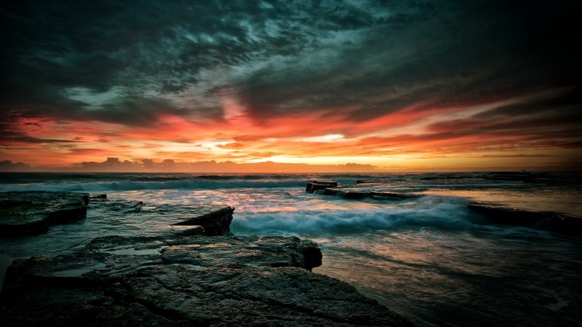 点击大图看下一张：美丽的夕阳海景图片